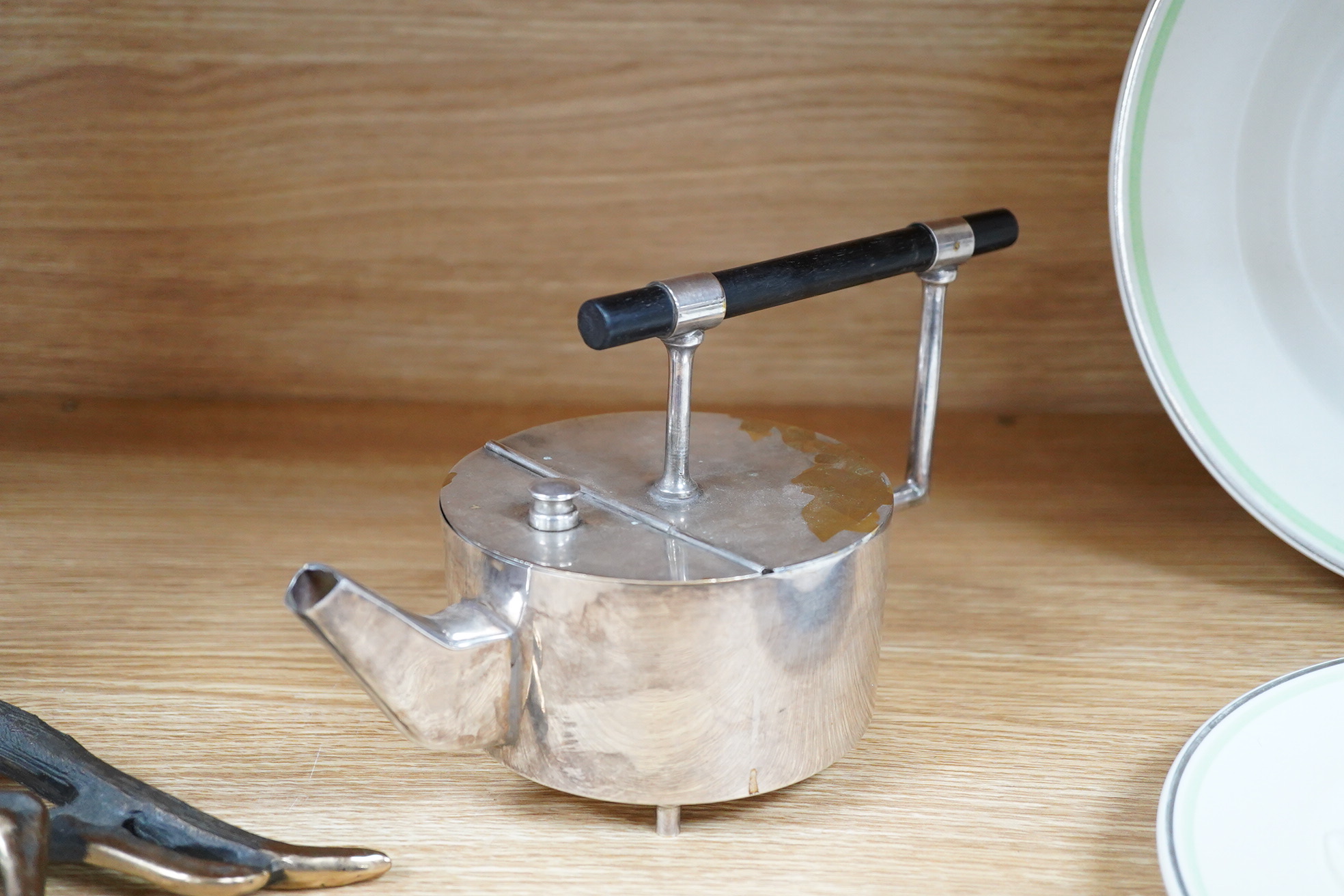 A reproduction modernist Christopher Dresser plated kettle, 24cm wide
